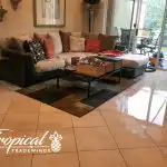 Living Room Water Damage from Ruptured Washing Machine Hose